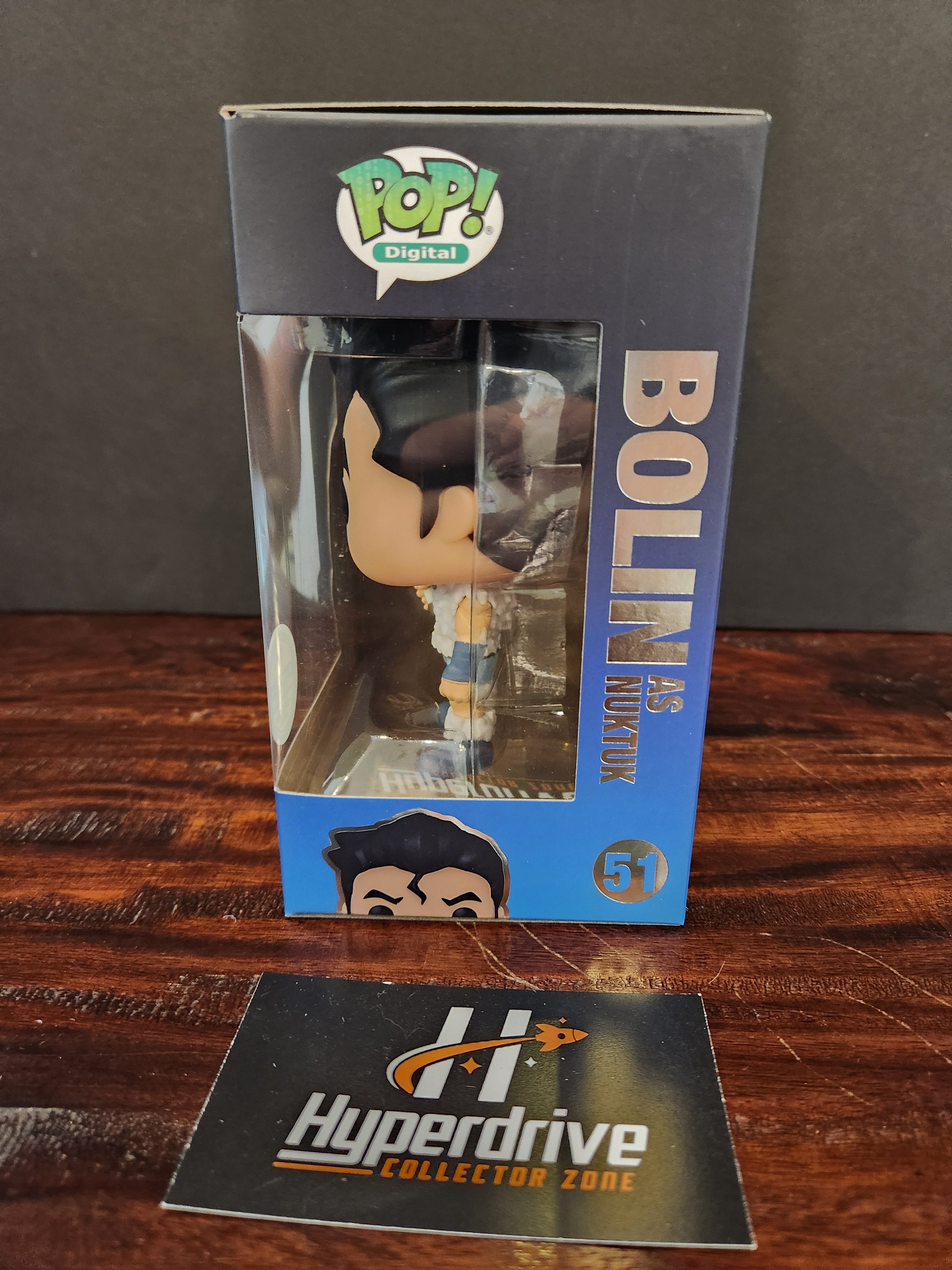 Funko Pop! Bolin shops as Nuktuk #51 NFT Redeemable in hand